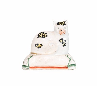 Lot 221 - A Staffordshire Earthenware Cat, circa 1860,...