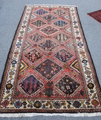 Lot 1212 - Bakhtiari Rug, the raspberry field of hooked...