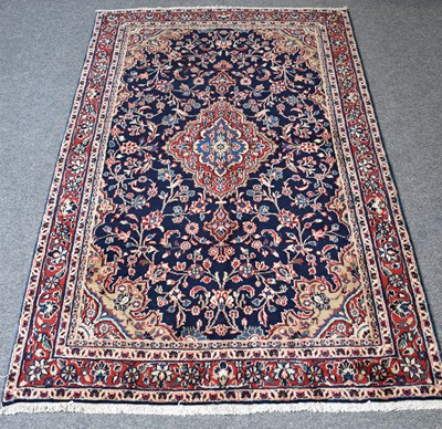 Lot 1208 - "Kashan" Village Rug, the indigo field of...