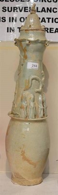 Lot 244 - A green glazed funerary jar, height 62cm