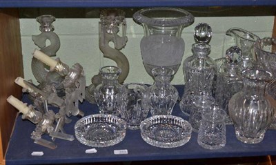 Lot 253 - Glassware comprising moulded glass urn; dolphin candelabrum and candlestick; cut glass large...