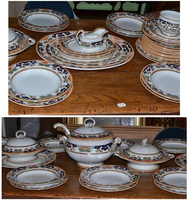 Lot 264 - A Mintons dinner service with floral and orange lustre border