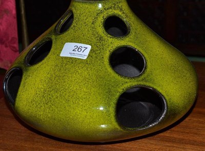 Lot 267 - Peggy Davies Ceramics lantern shaped vase in lime with vents