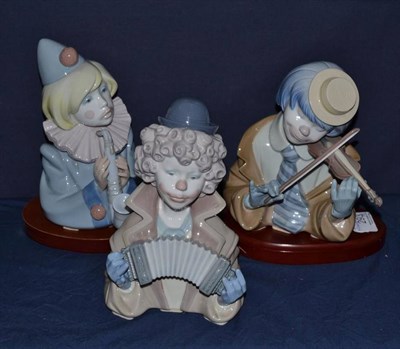 Lot 293 - Three Lladro clown busts; 'Fine Melody', 'The Blues' 5600 (on stand, boxed), Sad Note 5586 (on...