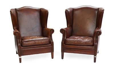 Lot 1286 - A Pair of Modern Brown Leather Wing Chairs (2)