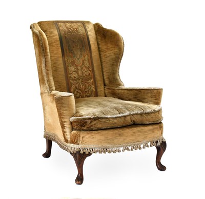 Lot 344 - A George II-Style Wing Armchair, early 20th...