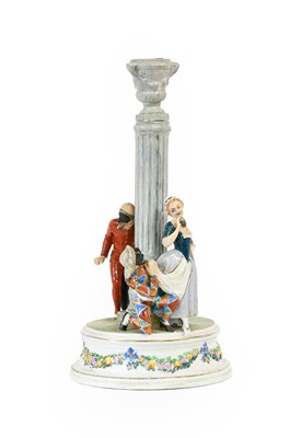 Lot 229 - A Cozzi Porcelain Comedia del Arte Candlestick...