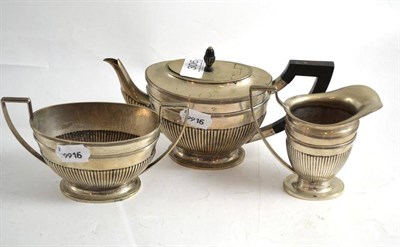 Lot 306 - A continental silvered metal three piece silver tea service, Holland, 833/1000 purity mark to base