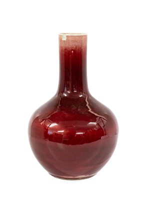 Lot 79 - A Chinese Sang de Boeuf Glazed Bottle Vase,...