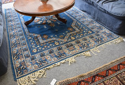 Lot 1219 - Berber Rug, the royal blue field with central...