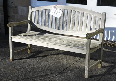 Lot 1086 - A Slated Wooden Garden Bench, by PTC Imports,...