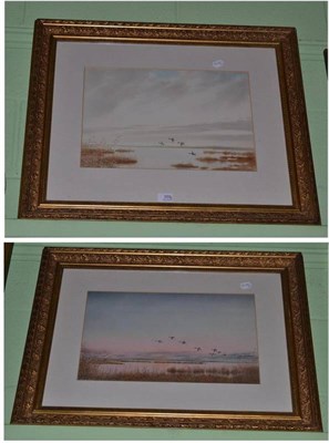 Lot 359 - Francis F Partridge (20th Century) Ducks and Geese in flight over Norfolk Marshlands, signed,...