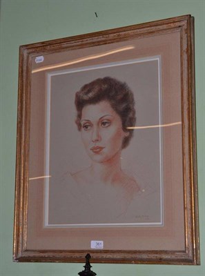 Lot 361 - Molly, Lady G Scott Bishop, American, chalk and charcoal portrait of a lady, signed and dated 1956