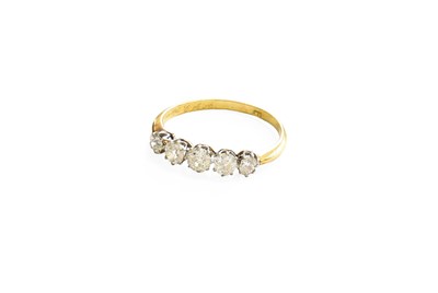 Lot 439 - A Diamond Five Stone Ring, the graduated old...