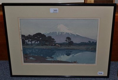 Lot 385 - A Japanese woodblock of a mountain and river landscape, indistinctly signed