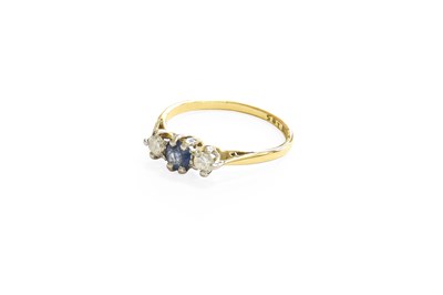 Lot 447 - A Sapphire and Diamond Three Stone Ring, the...