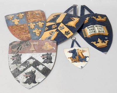 Lot 286 - Five Toleware Heraldic Crests, 19th century,...