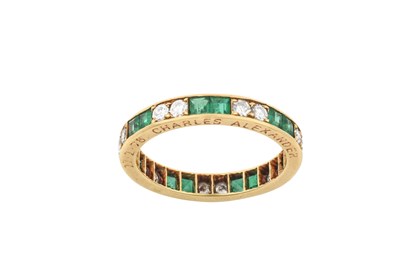 Lot 2054 - An 18 Carat Gold Emerald and Diamond Eternity...