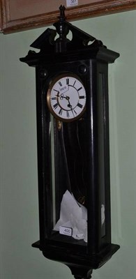 Lot 400 - Ebonised wall clock