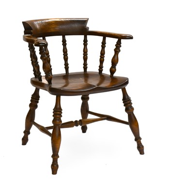 Lot 1279 - An Elm Captains Chair