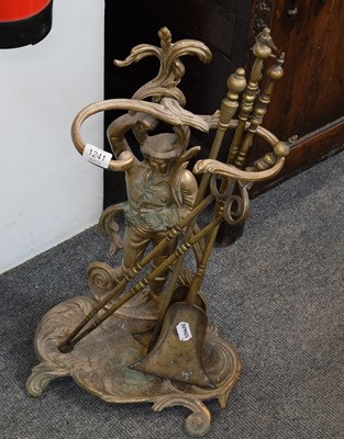 Lot 1241 - A Brass Figural Stick Stand, 60cm, together...