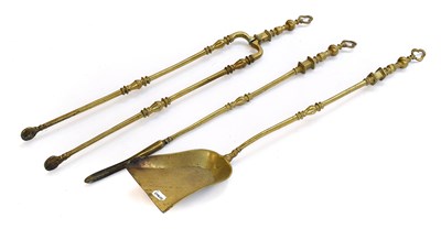 Lot 1270 - A Set of Three 19th Century Brass Fire Tools