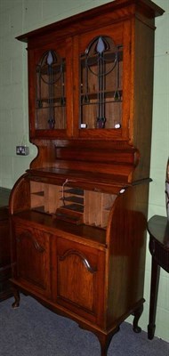 Lot 411 - An oak bureau bookcase with tambour front and Arts & Crafts style glazed bookcase top