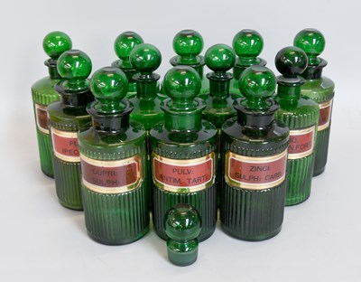 Lot 239 - A Collection of Twelve Large Green Glass...