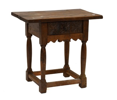 Lot 1180 - A Provincial Style Carved Oak Lamp Table, with...