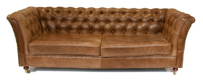 Lot 1140 - A Three Seater Buttoned Brown Leather and...