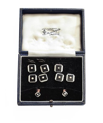 Lot 455 - An Onyx and Split Pearl Dress Stud and...