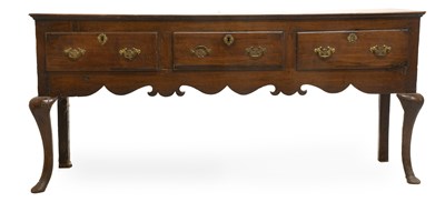 Lot 435 - A George II Oak Low Dresser, mid 18th century,...