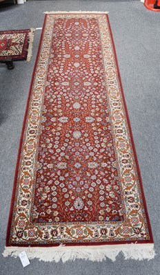 Lot 1199 - Hereke Wool Runner, the burgundy floral field...