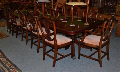 Lot 450 - Reproduction mahogany triple pedestal dining table and a set of twelve (10+2) reproduction mahogany