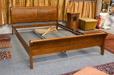 Lot 1186 - A Modern Oak Sleigh Bed, 158cm by 220cm by 90cm