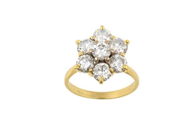 Lot 2035 - A Diamond Cluster Ring the central raised...