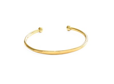 Lot 382 - A 9 Carat Gold Torque Bangle, measures 6.0cm...