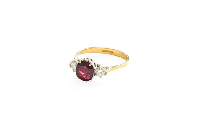 Lot 383 - An 18 Carat Gold Ruby and Diamond Three Stone...