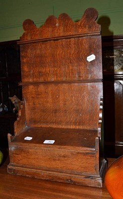 Lot 461 - A Georgian oak spoon rack