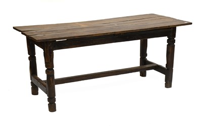 Lot 1302 - An Oak Three Plank Top Trestle Table,...