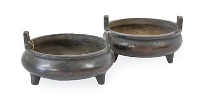 Lot 179 - A Matched Pair of Chinese Bronze Tripod...