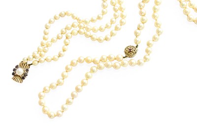 Lot 415 - A Triple Row Cultured Pearl Necklace, the...