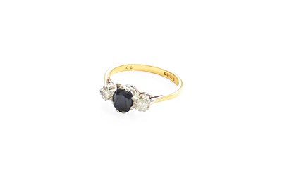 Lot 403 - An 18 Carat Gold Sapphire and Diamond Three...