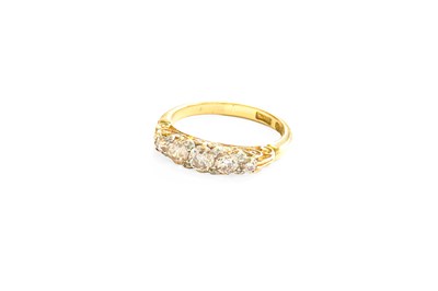 Lot 419 - A Diamond Five Stone Ring, the graduated old...