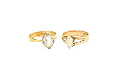 Lot 388 - An 18 Carat Gold Opal Ring, finger size M; and...