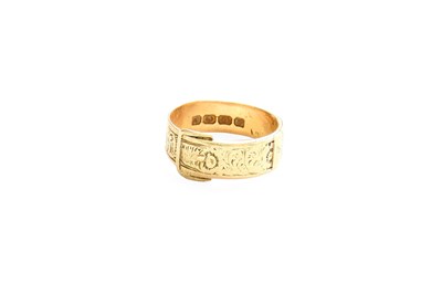 Lot 414 - An 18 Carat Gold Textured Buckle Ring, finger...