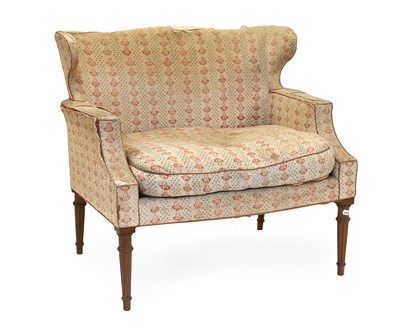 Lot 1181 - A Regency Oversized Armchair, on tapering...