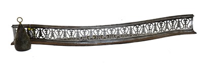 Lot 1192 - A George III Pierced Steel Fender, with...