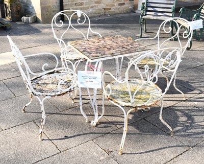 Lot 1080 - A Square Garden Table, on scrolling wrought...