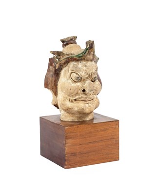 Lot 129 - A Chinese Sancai Glazed Head of a Temple...